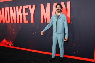 Dev Patel’s ‘Monkey Man’ turns saffron to red as India release uncertain