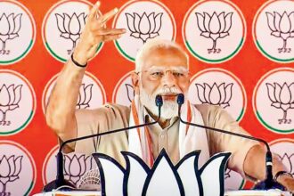 Modi again warns of Congress plot; EC mum