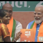 PM Narendra Modi presents manifesto to Bastar's daughter Neelavati Maurya | India News