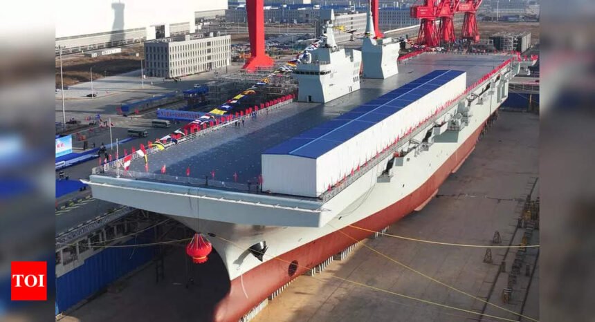 China launches largest amphibious warship in show of naval power