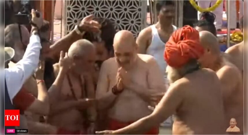 Amit Shah takes holy dip at Triveni Sangam in Prayagraj during Maha Kumbh visit | India News