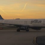 Passenger opens plane exit door at Boston airport after 'argument with girlfriend', sparks panic