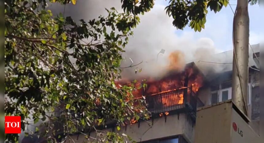 A fire broke out at Marine Chambers, a ground-plus-five residential building next to Zaffer Hotel in Marine Lines, around 12:30 PM on Saturday. According to officials, the blaze was confined to a room on the fifth floor. ​​Firefighters reached the spot and began firefighting operations. ​​No injuries have been reported so far. | Mumbai News