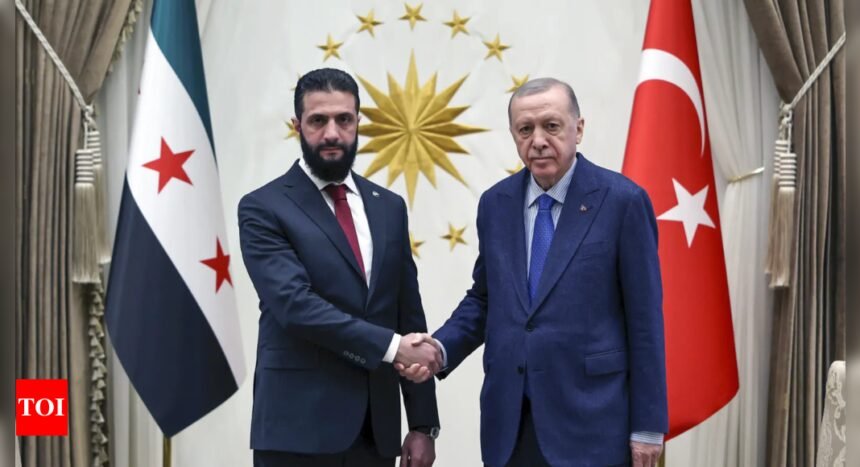 Syria's interim leader holds talks with key ally Turkey on his second international trip