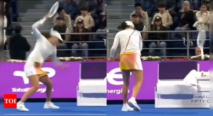 Watch: Opponent shocked as Iga Swiatek smashes racquet in emotional on-court outburst | Tennis News